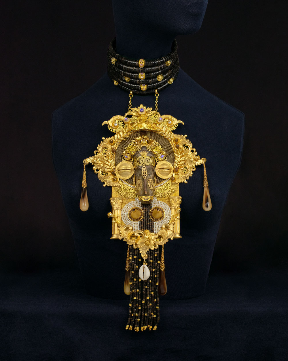 Sculptural reliquary plastron necklace with African wooden mask and Orthodox-inspired gold filigree, one-of-a-kind wearable art by Svetlana Kisselev